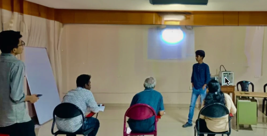 Shajin at hackathon, pitching his idea to judges